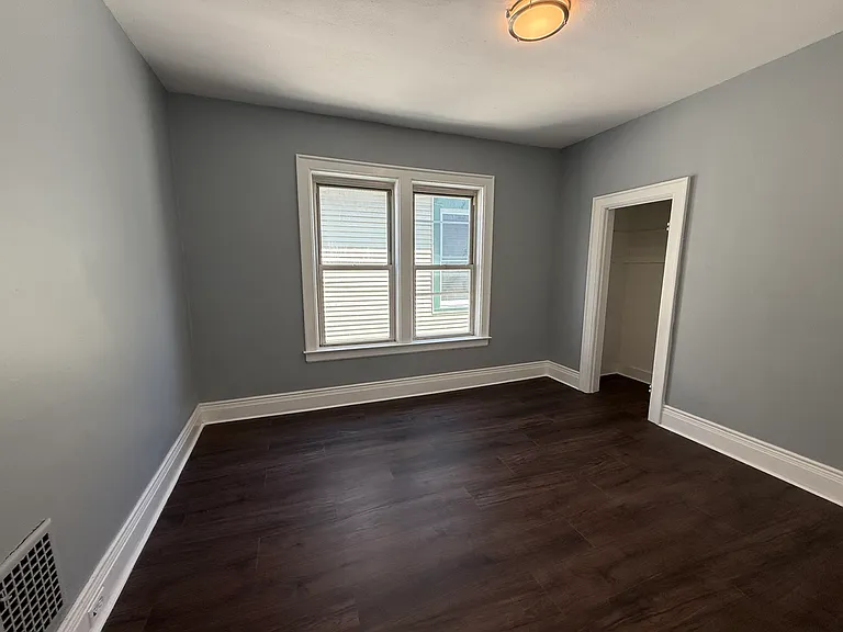 Bedroom 3 with 2 windows and 1 closet