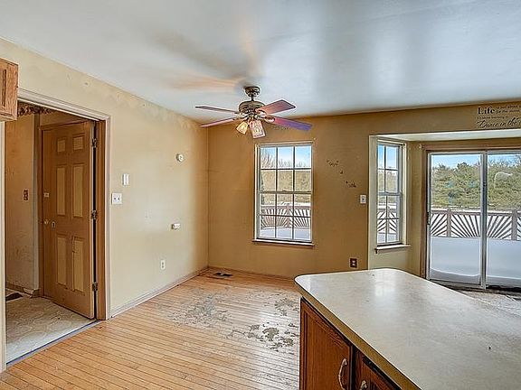 KITCHEN AND BREAKFAST AREA DOOR LEADING TO GARAGE