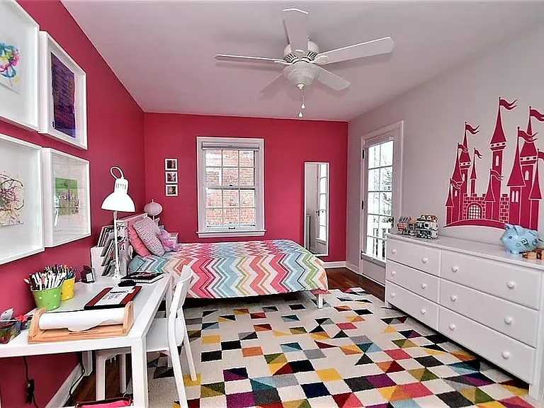Third bedroom on the 2nd floor with door to the 2nd floor patio/deck on the right of the image