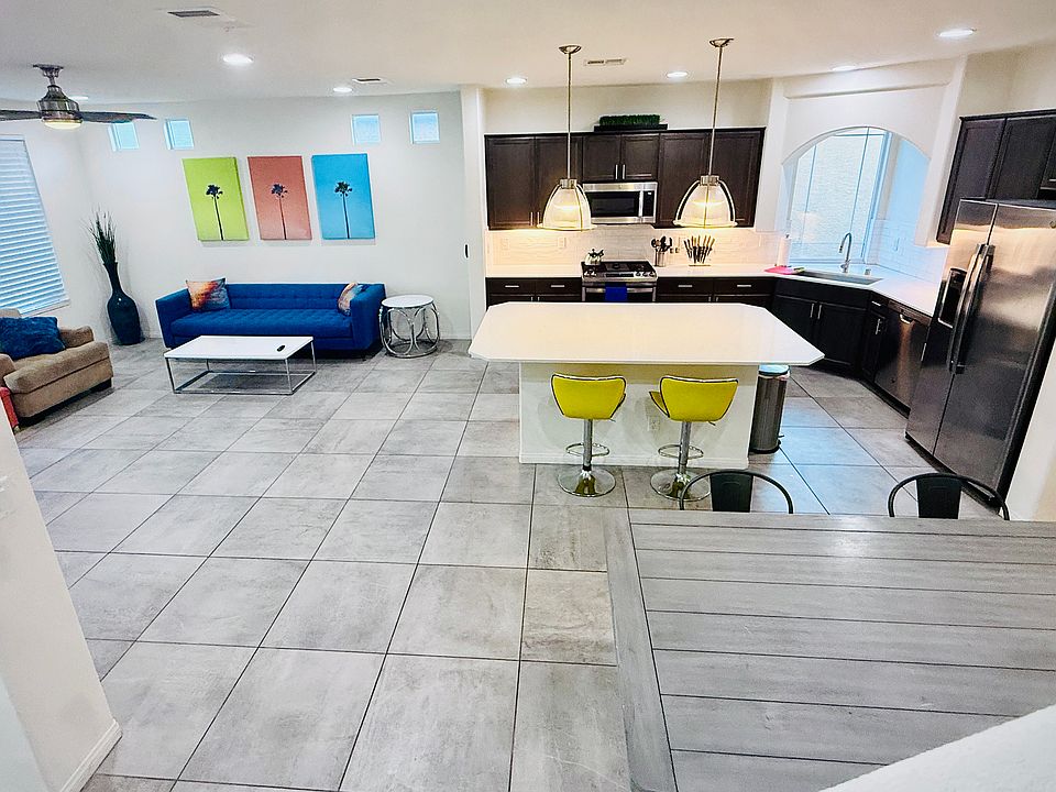 The fun fully-furnished home has open floor plan with Kitchen, Counter, Living Room, and more...