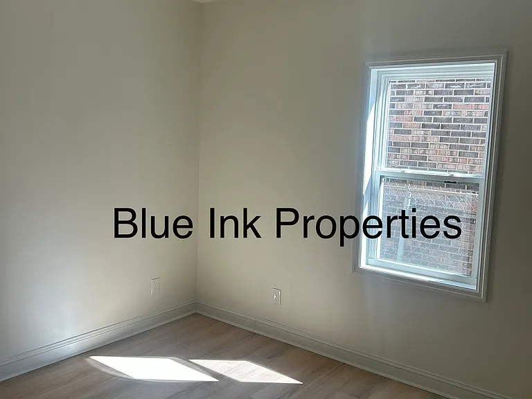 326 E 3rd St — Photo 11