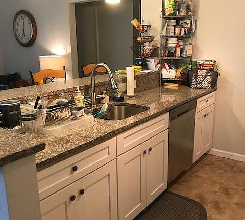 Fully renovated and upgraded Kitchen opens to living area.