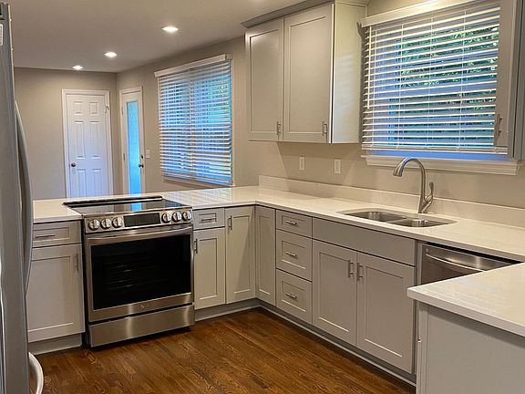 - lots of new windows for natural lighting and obscure rain glass insulated font door