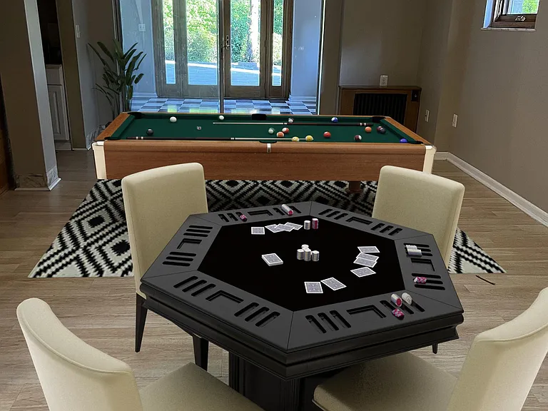 Lower-level game room with walk out to patio and yard