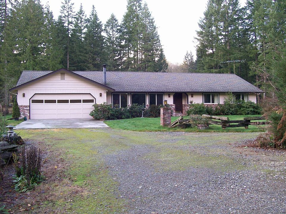Quality Built Rambler Home on Timbered  Acreage, and Barn