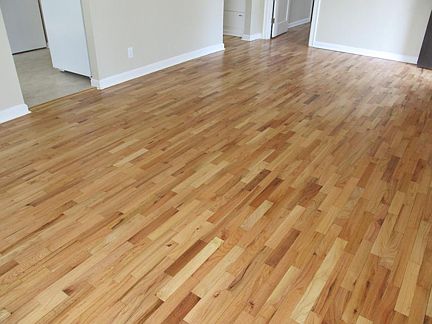 Refinished oak floors.