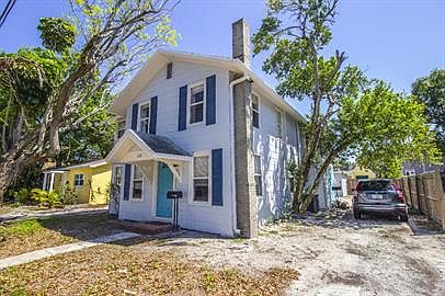 Entrance is on the right hand side of the house. Pull up to side door - Unit 2