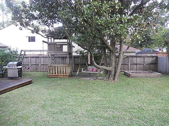 Back Yard with Wooden Play Gym