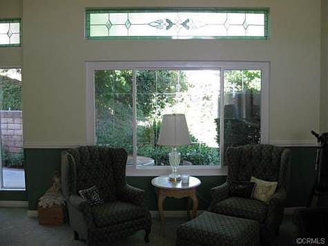 The new dual pane windows shine in the living room light.