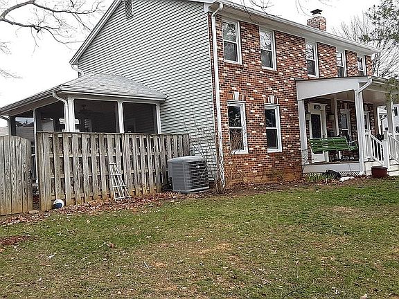 Large front yard. Front porch with swing.