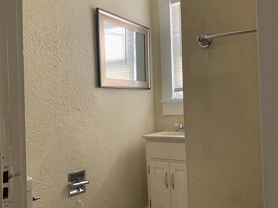 Bathroom has tiled show stall