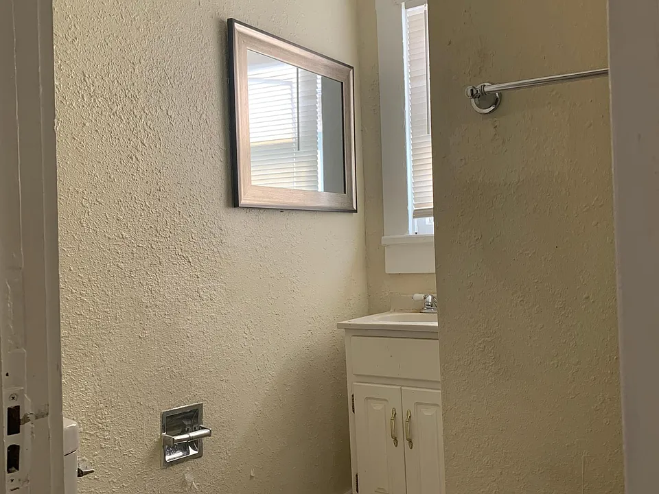 Bathroom has tiled show stall