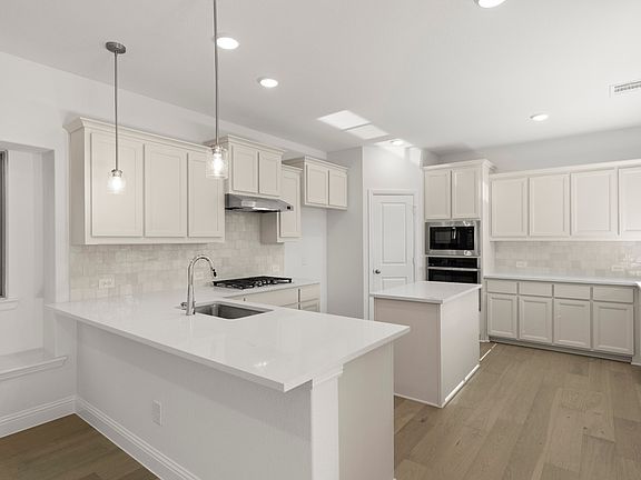 Trentino two-story floor plan featuring 4 bedrooms, 3 bathrooms, a welcoming front porch, formal din