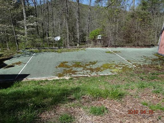 yard with concrete pad