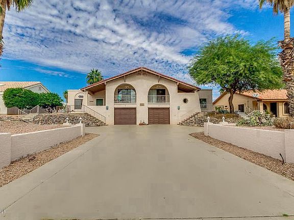 Front of Duplex, One car garage and parking spot in front