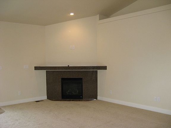 Gas fireplace with granite tile accent