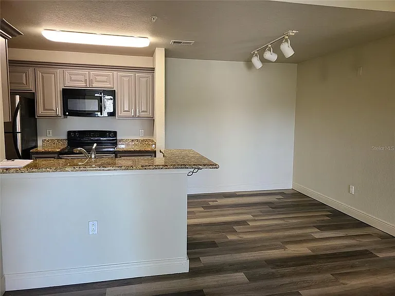 8911 Manor Loop #205 — Photo 12