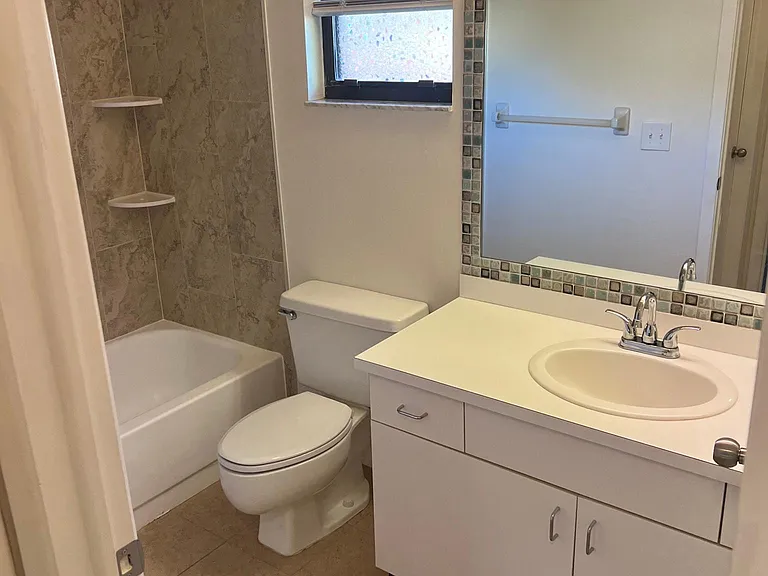 Bathroom with Tub/Shower. New tile and tub resurfaced in 2022.