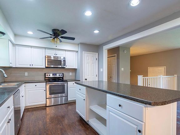 Big kitchen island. Big pantry next to kitchen!