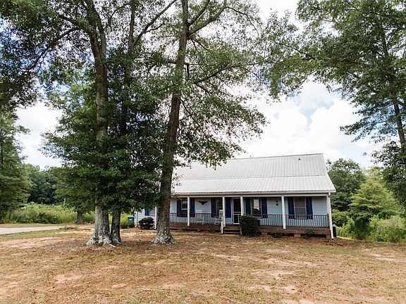 Shade trees cover the home.