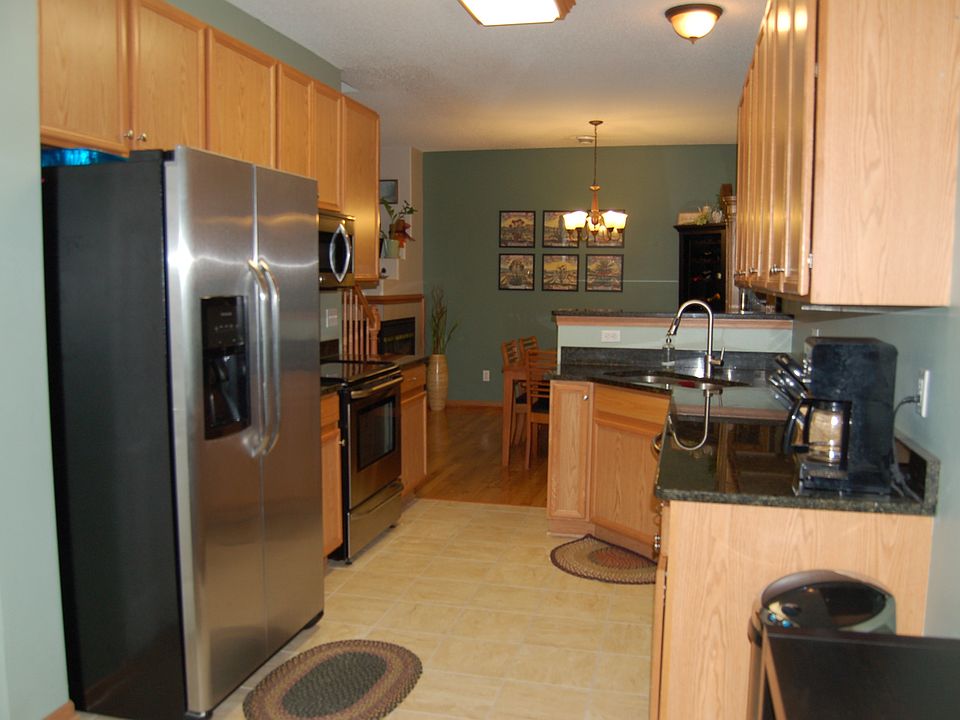 New SS appliances, granite countertops, and ceramic tile