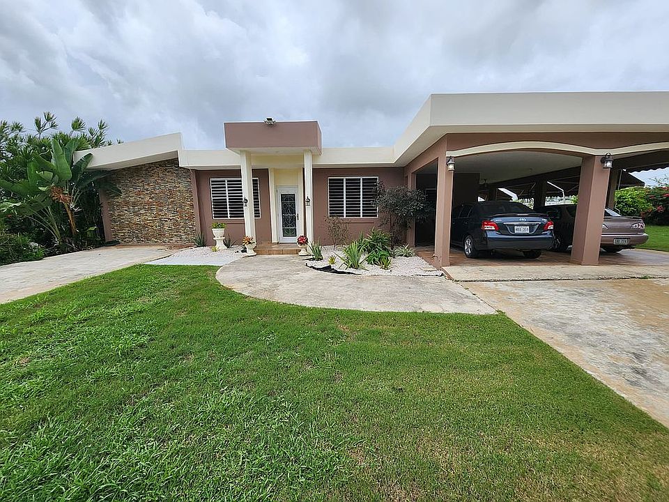 Front; 2 driveways; carport