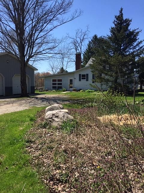 pulling in - garage bay on right available