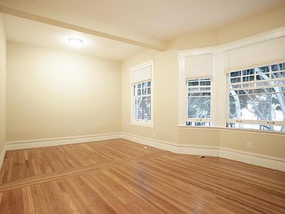 Hardwood floor, double paned windows, cable-ready, ample storage.. charming!