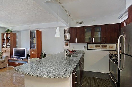 2nd image of 555 W 23rd St APT S11q