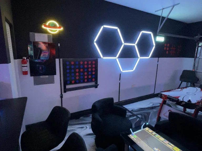Game Room wall has Connect 4 and Tic Tac Toe