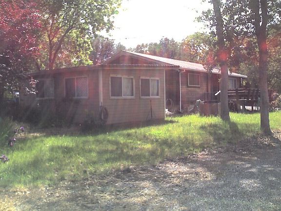 SPA HOUSE AND LOG CABIN FRONT SIDE