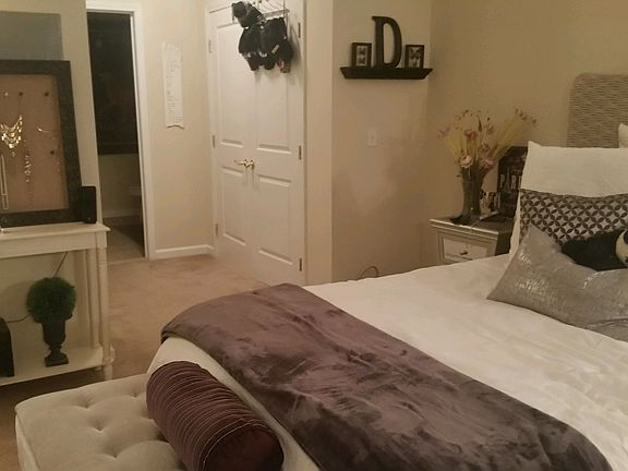 Actual Unit Bedroom and Hall to closet, W&D and Bathroom