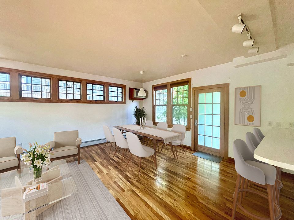 Living and Dining room with breakfast bar and courtyard access (place for outdoor table)