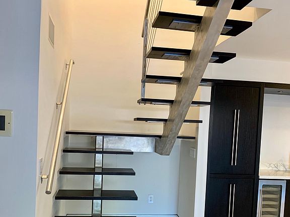 2 Story unit with open, custom built stairs