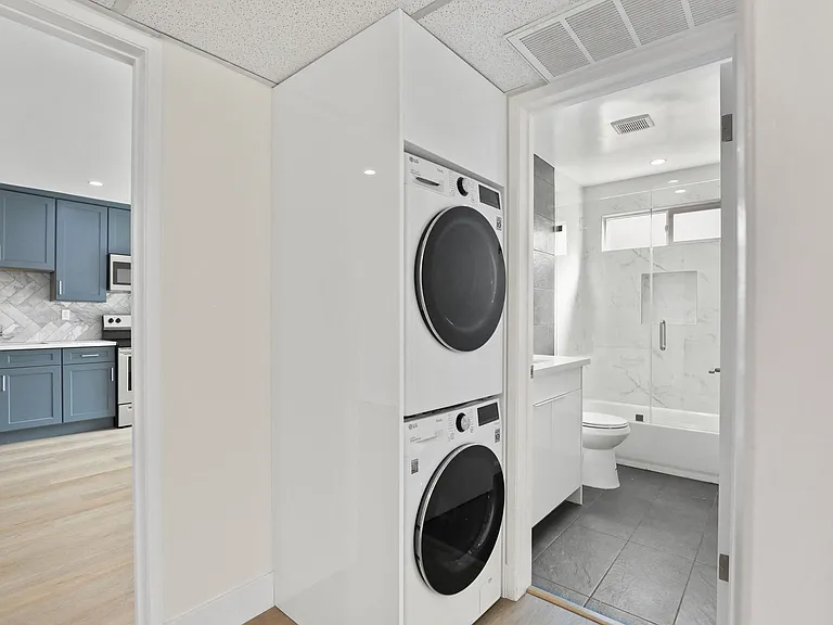 Bathroom with Full-Size Washer and Dryer