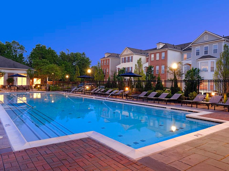 Swimming pool and sundeck with lounge seating