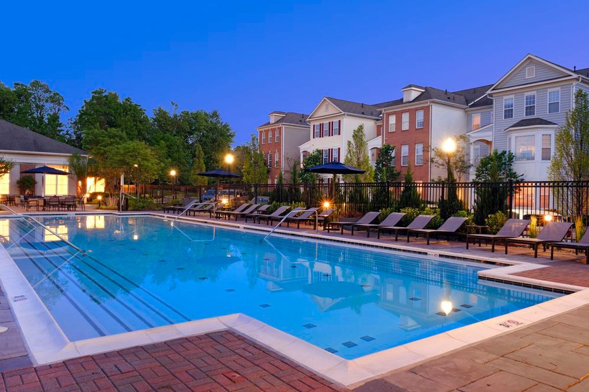 Swimming pool and sundeck with lounge seating