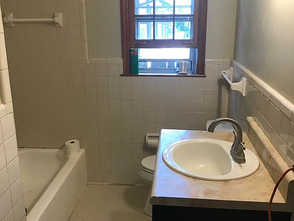 Tile bath with tub and shower