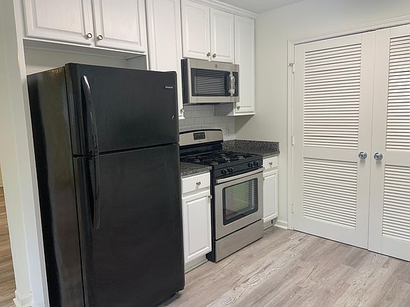 Plenty of cupboard space, plus a gas range and new microwave.