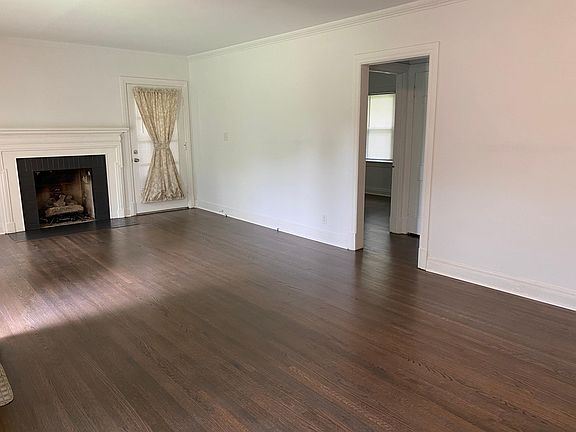 Door in family room leads to the side covered porch