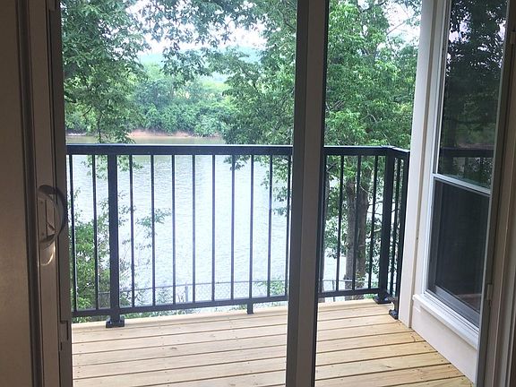River front deck; new sliding doors with blinds btw the glass panels
