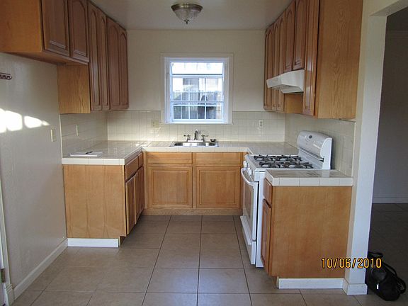 kitchen, stove and disposal