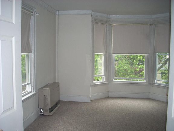 Living room/2nd bedroom possible, large windows, lots of natural light.