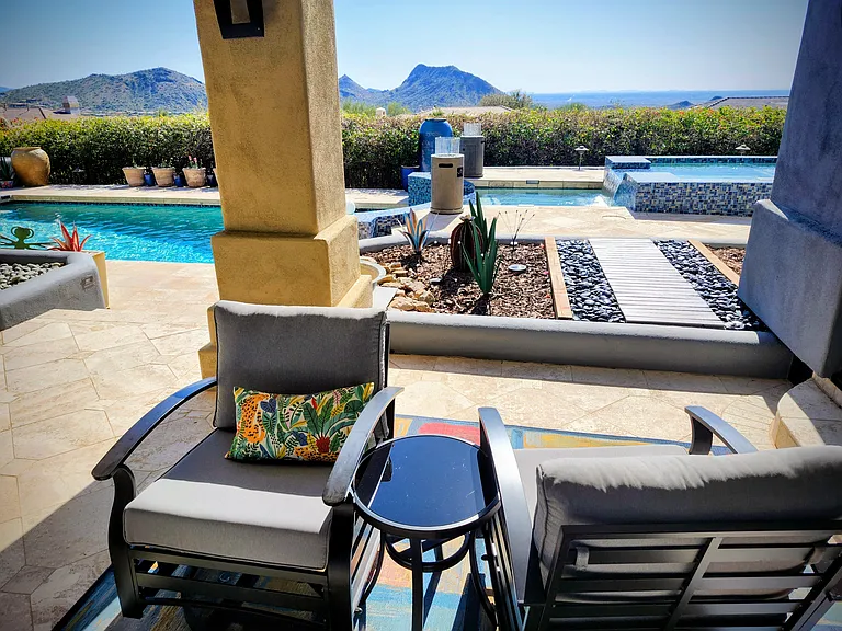 Just a few small steps from your primary suite to your hot tub