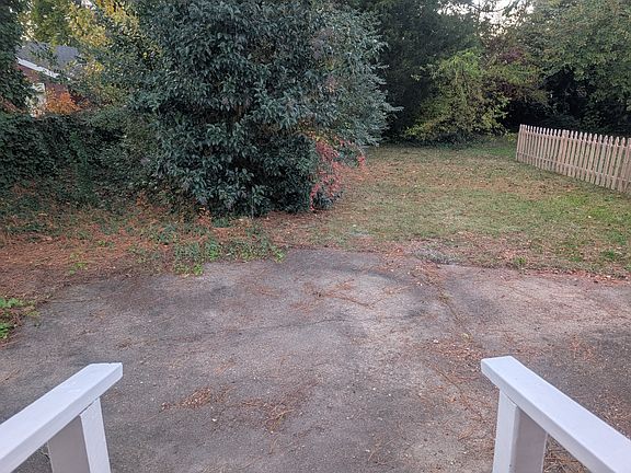 Big backyard, partially fenced for privacy.