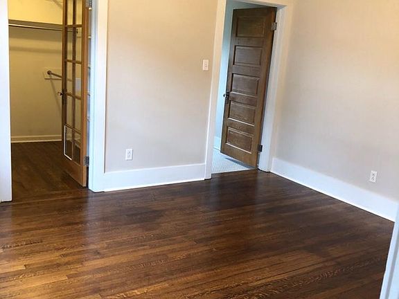 Large bedroom with walk-in closet and access to laundry/mud