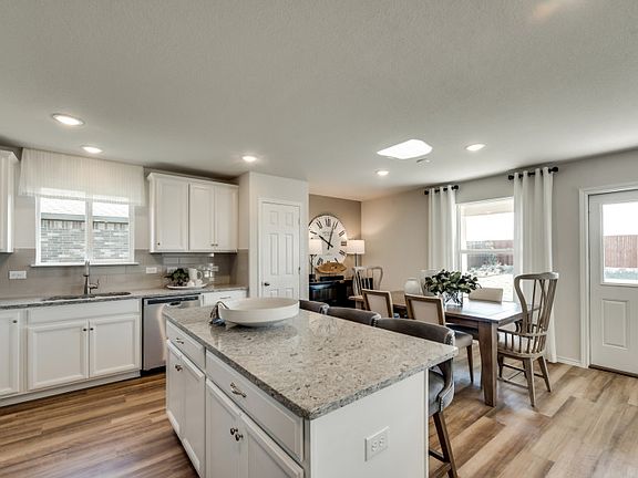 Model Representation - Open concept throughout kitchen and dining areas