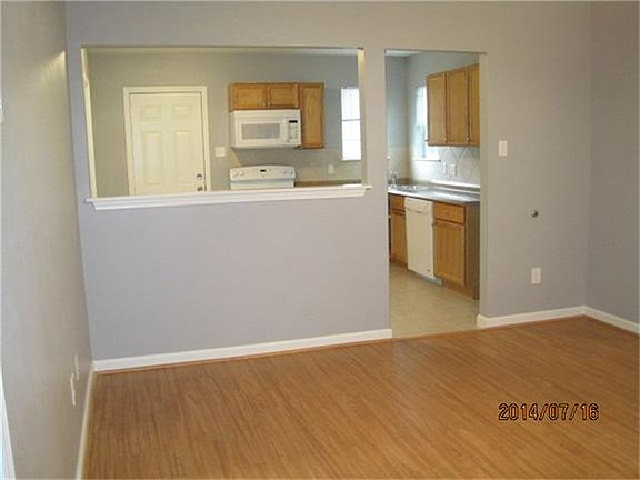 VIEW LIVING AREA INTO KITCHEN