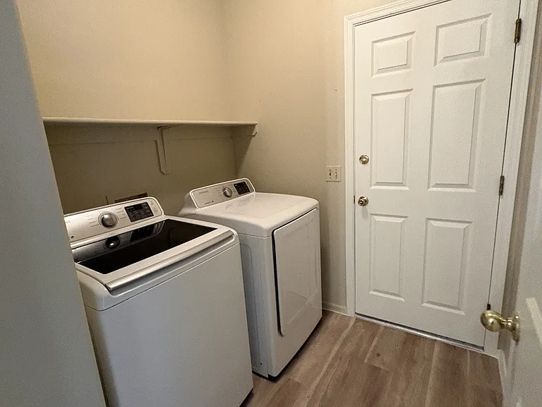 Laundry room with washer and dryer included