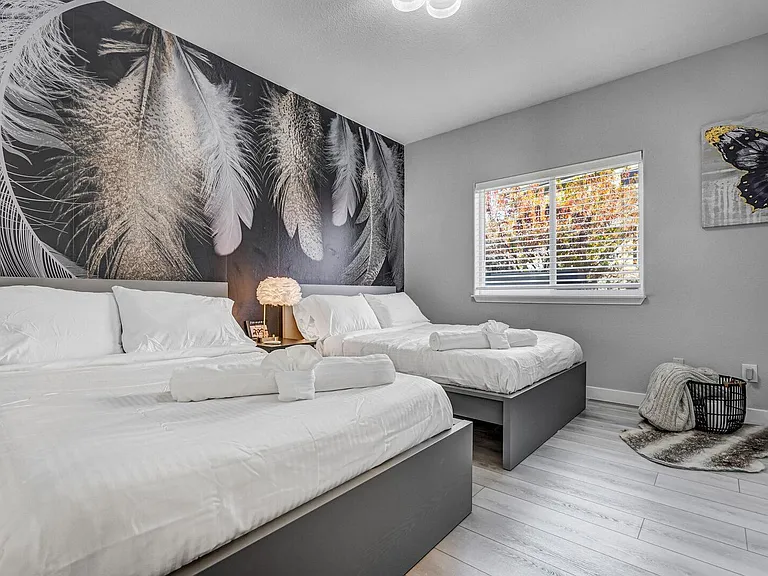 Main level bedroom with two full sized beds!